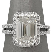 GIA K VVS2 Emerald Cut 4.76ct Diamond Split Shank Halo Ring