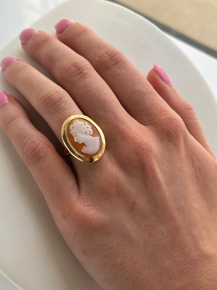 Seen on hand this vintage 14k cameo is delicate and substaintal.