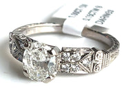 Antique 1.00 ct Oval Center Stone with 0.15 ctw  Diamond Band set in 18k White Gold ring