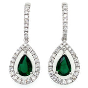 1.03 CTW Pear Shaped Emeralds with 0.46 CTW Diamonds set in 18K White Gold