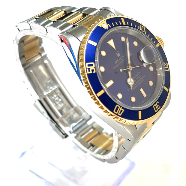 Pre-Owned Rolex Oyster Perpetual Submariner Date blue dial with Original box & papers