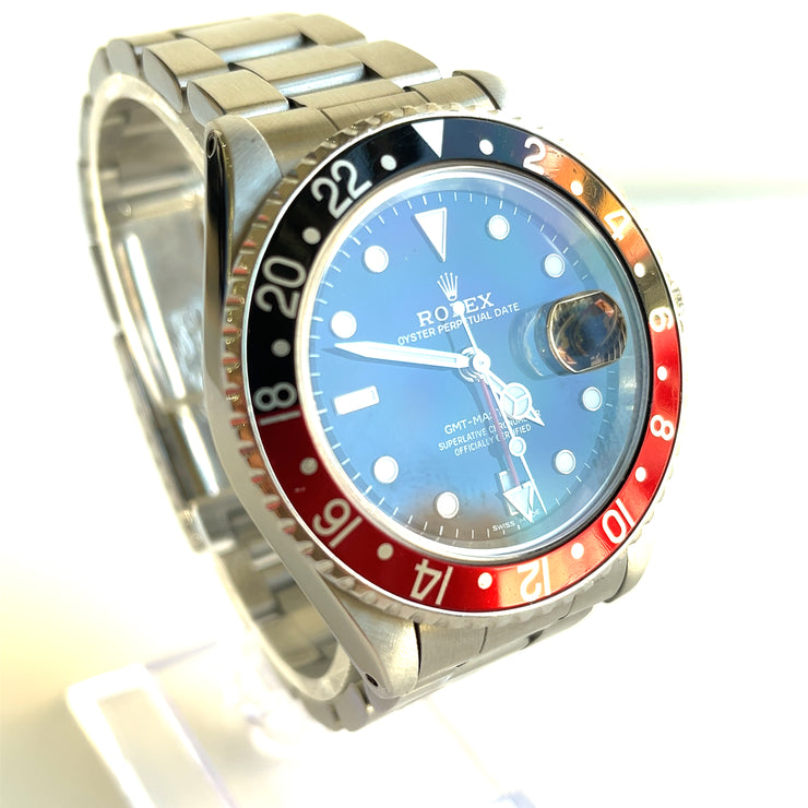 pre-owned Rolex GMT-Master II 16710 Silver Oyster Bracelet and Red & Black Bezel box paper