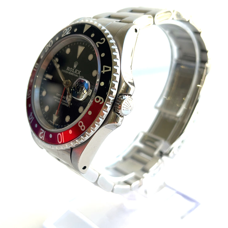 pre-owned Rolex GMT-Master II 16710 Silver Oyster Bracelet and Red & Black Bezel box paper