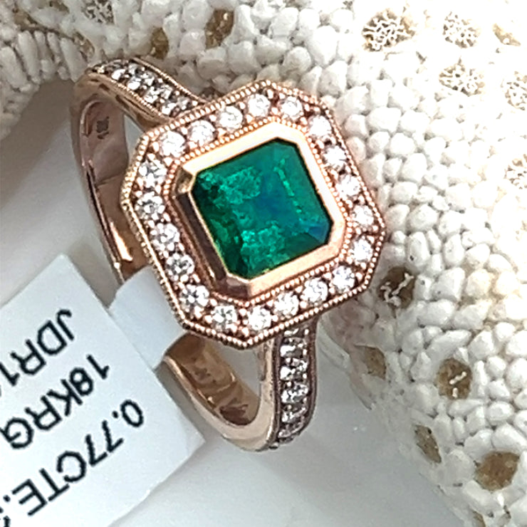 Emerald and diamond rose gold ring