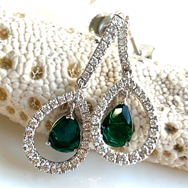 1.03 CTW Pear Shaped Emeralds with 0.46 CTW Diamonds set in 18K White Gold