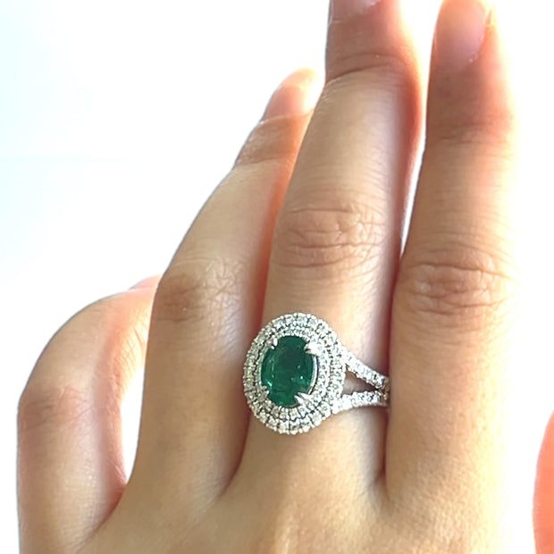 Emerald with double halo diamond ring