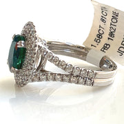 Emerald with double halo diamond ring