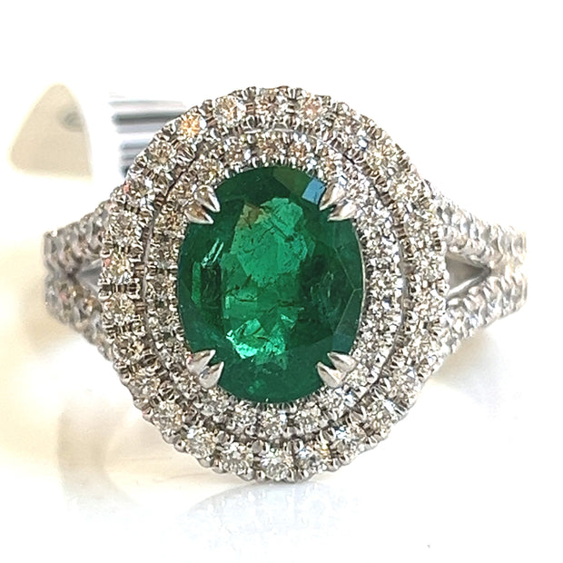 Emerald with double halo diamond ring