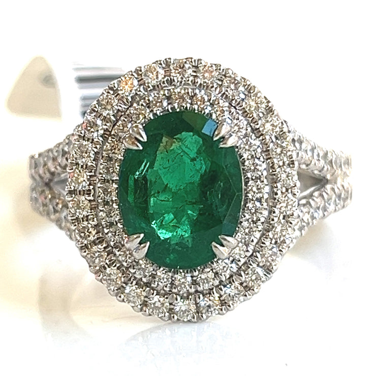 Emerald with double halo diamond ring