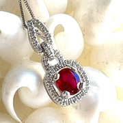 Ruby and Diamond Halo Pendant