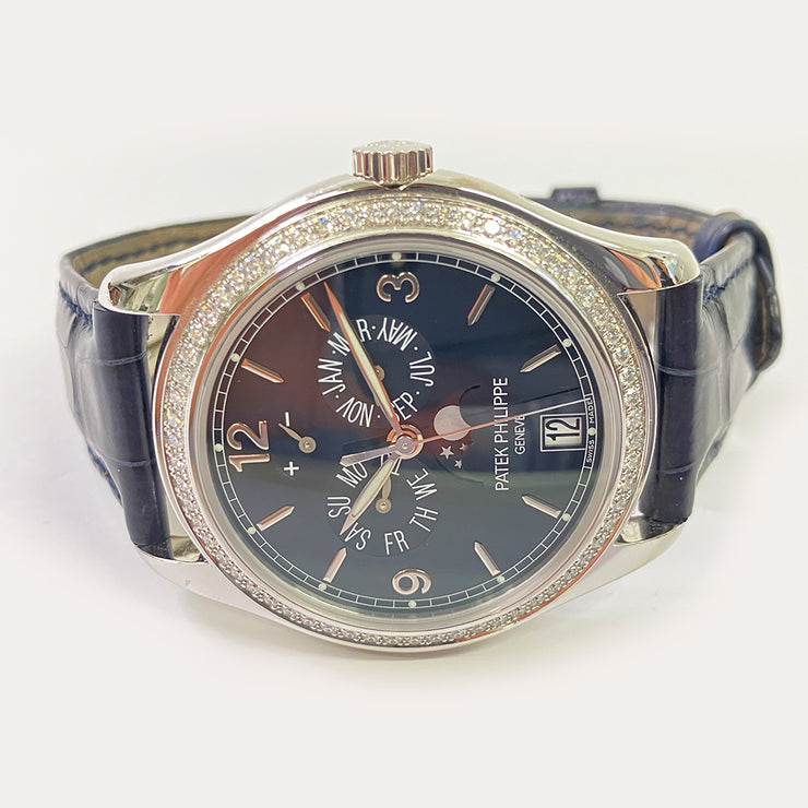 Pre-owned Patek Philippe Complications 5147G-001 Diamond Bezel Annual Calendar watch with original box & papers