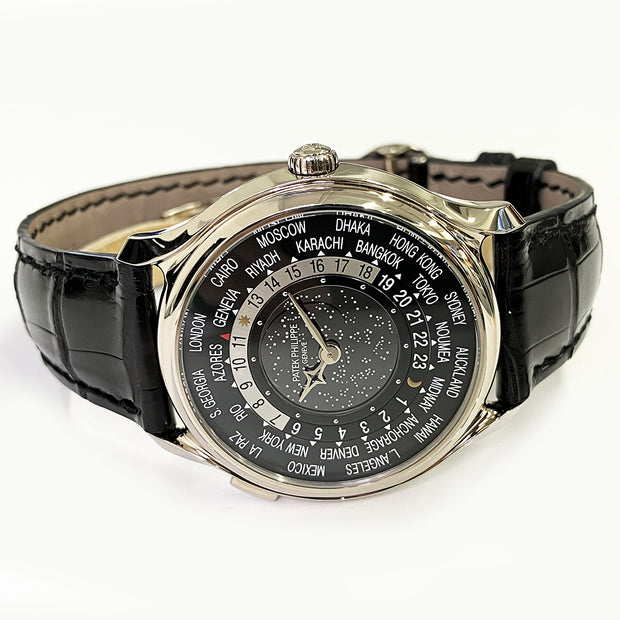 Pre-owned Patek Philippe Anniversary World Time Moon watch 5575G-001 black dial with original box & papers