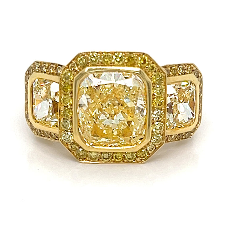 Yellow Diamond Three Stone Halo Ring