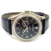 PRE-OWNED PATEK PHILIPPE COMPLICATIONS 5147G-001 DIAMOND BEZEL ANNUAL CALENDAR WATCH WITH ORIGINAL BOX