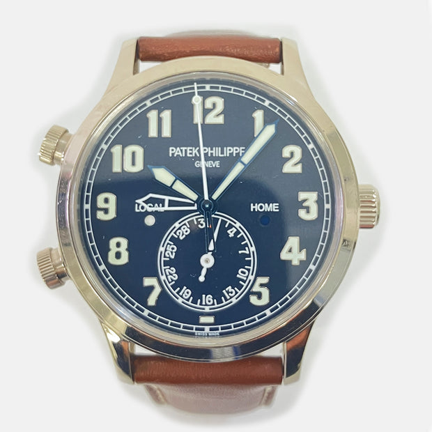 PRE-OWNED PATEK PHILIPPE CALATRAVA PILOT TRAVEL TIME 5524G-001 BLUE DIAL Brown Leather WITH ORIGINAL BOX & PAPERS