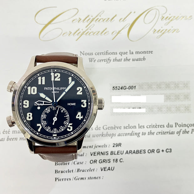 PRE-OWNED PATEK PHILIPPE CALATRAVA PILOT TRAVEL TIME 5524G-001 BLUE DIAL Brown Leather WITH ORIGINAL BOX & PAPERS