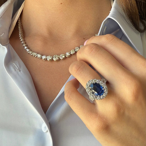 6.11 ct Natural Blue Sapphire Ring with Diamond Halo