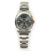 Pre-owned Rolex Oyster Perpetual 114300 Rhodium Dial watch with original box and papers Mint