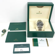 Pre-owned Rolex Oyster Perpetual 114300 Rhodium Dial watch with original box and papers Mint