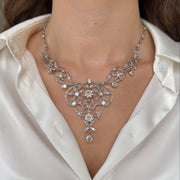 Stunning multi cut mutli-diamond antique necklace shown on model.