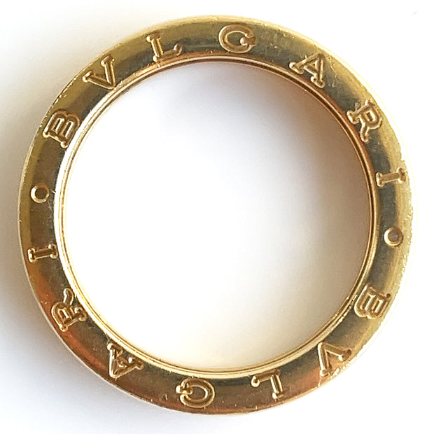 Pre-owned Bvlgari 18K yellow gold band ring with visible hallmarks, showing light signs of wear.