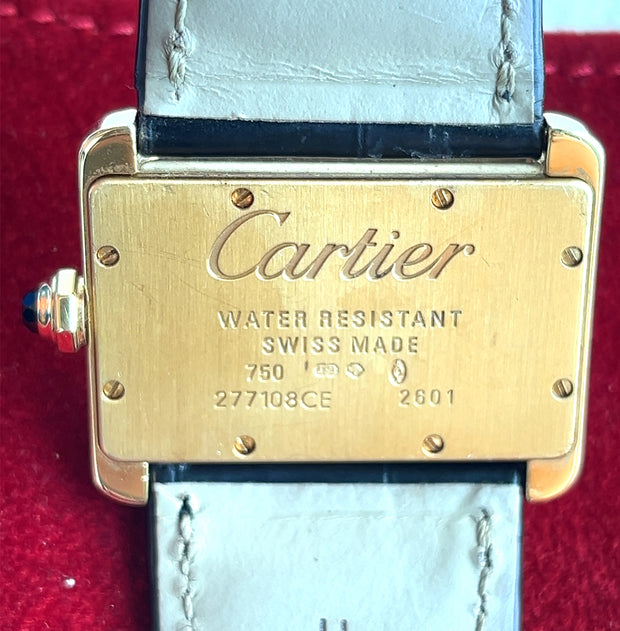 Here showing the caseback and serial number.