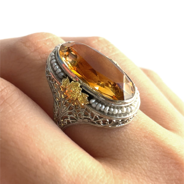 Statement Vintage Citrine Ring Features a
Glowing citrine with pearls to create a graceful, heirloom-worthy design.