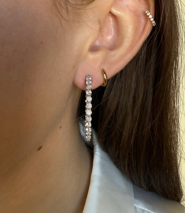 Luxurious 4.5 CTW Diamond Hoops with a unique design that highlights sparkling diamonds inside and out, crafted in 18K white gold.