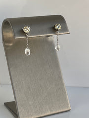 Diamond drop earrings set in platinum.
