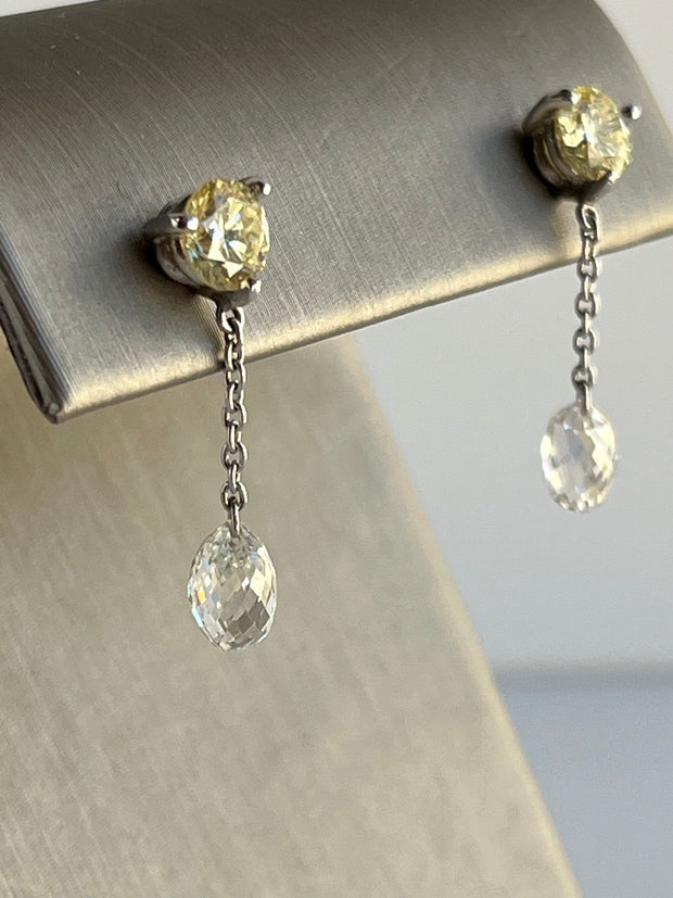 Natural round brilliant diamonds with natural briolette diamond drops in platinum.