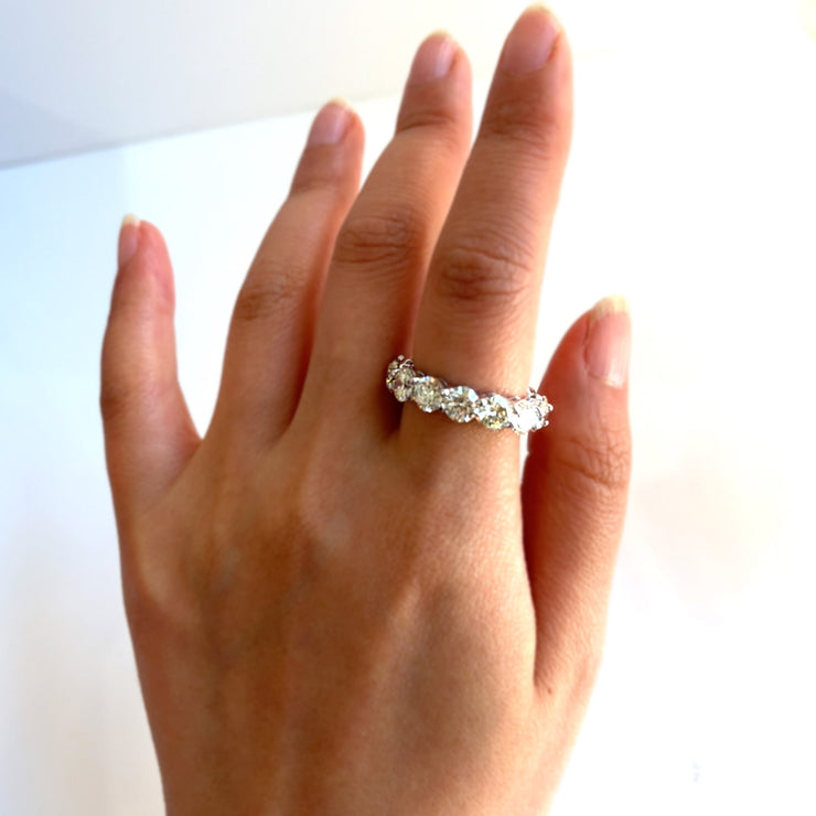  Ideal as an eternity ring, anniversary band, or timeless statement piece.