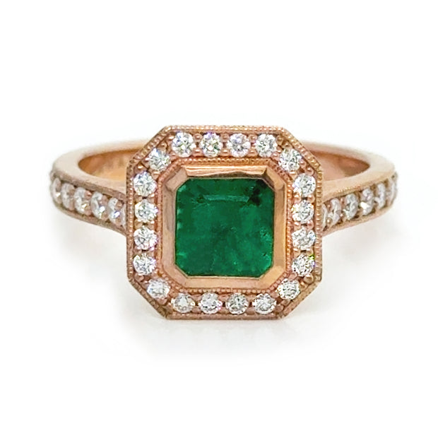 Front view of the emerald and diamond ring.