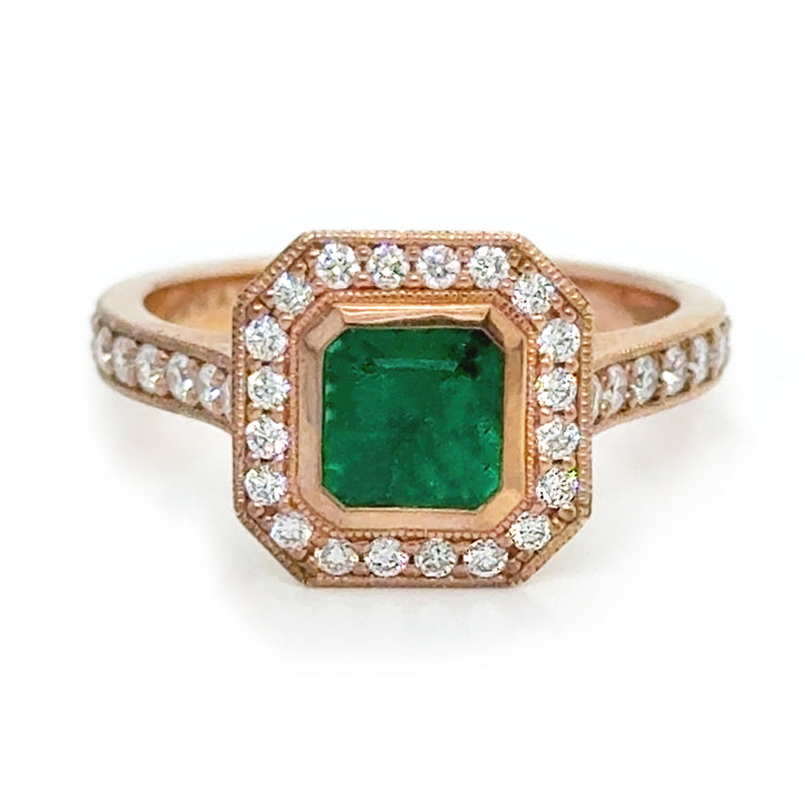 Front view of the emerald and diamond ring.