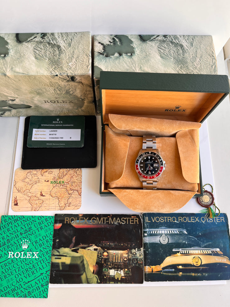 pre-owned Rolex GMT-Master II 16710 Silver Oyster Bracelet and Red & Black Bezel box paper