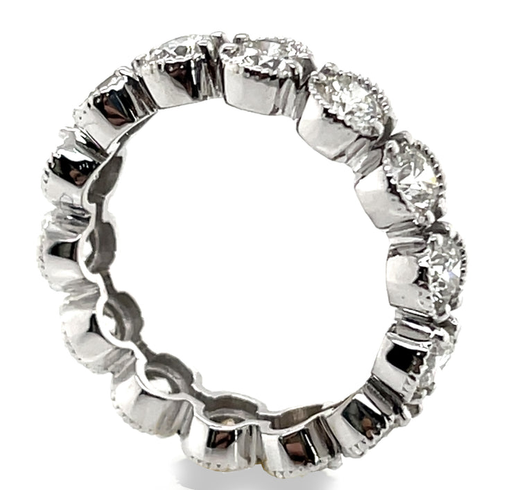 A side view showing the natural round brilliant setting from the inner band.