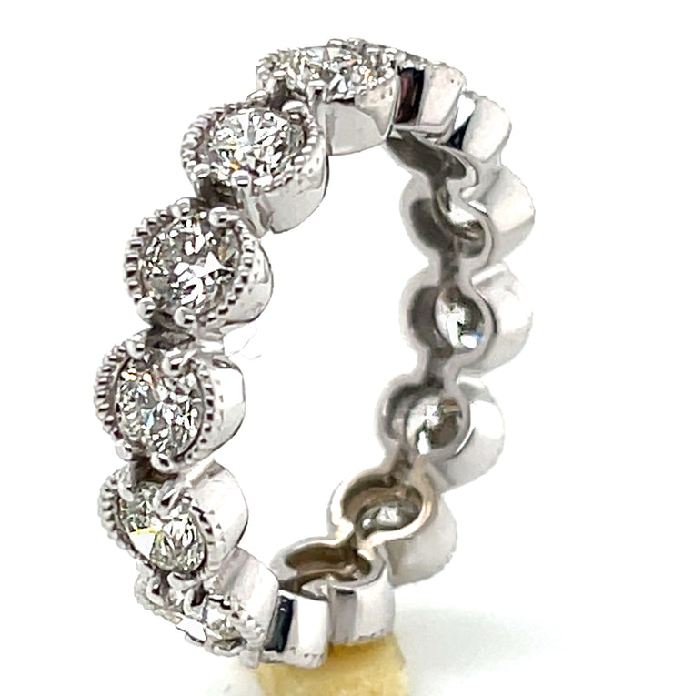 A closer look at the natural round brilliant diamonds set in both prong and bezel settings.