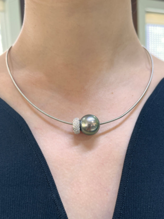 The necklace worn on model, demonstrating its ability to elevate formal and sophisticated looks with timeless elegance.