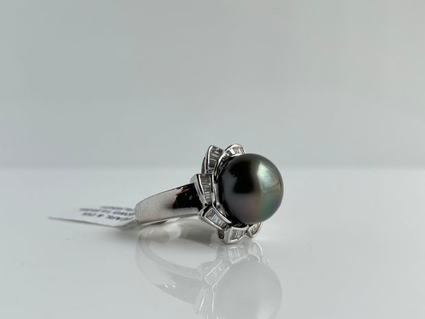 Diamond accented black sea pearl ring.