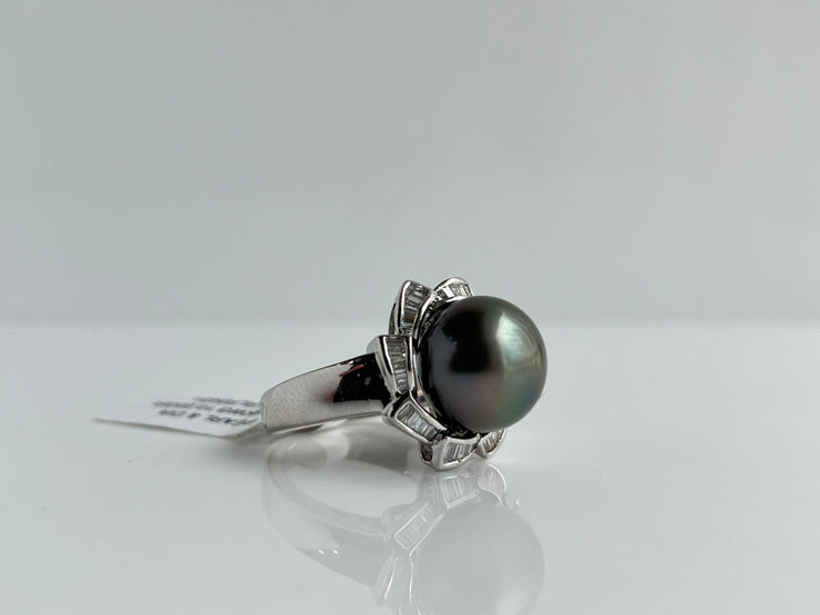 Diamond accented black sea pearl ring.