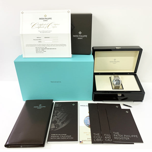 Shown is the complete set watch, box and papers.