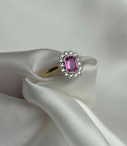 0.80 CT Pink Sapphire and 0.30 CTW Diamond Two Tone Diamond Halo Ring