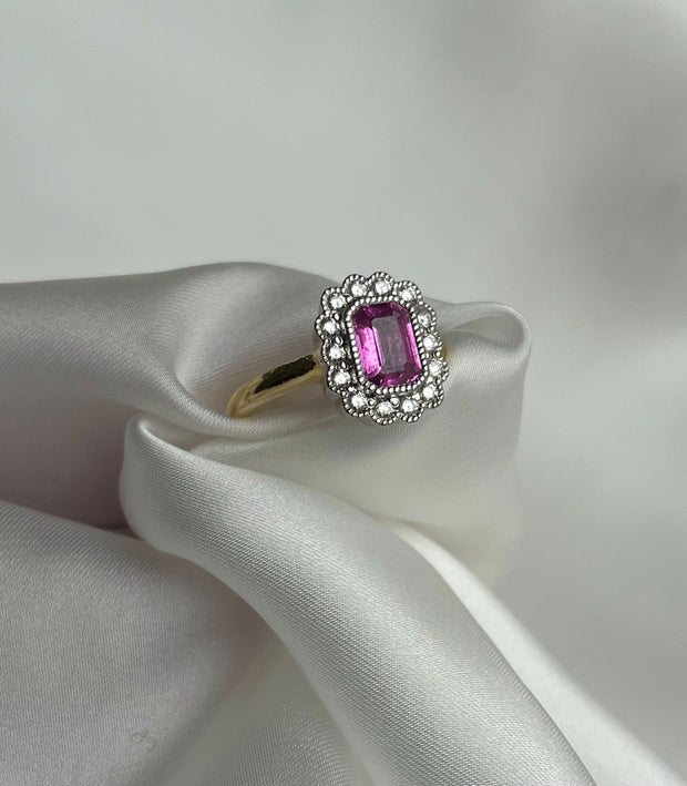 0.80 CT Pink Sapphire and 0.30 CTW Diamond Two Tone Diamond Halo Ring
