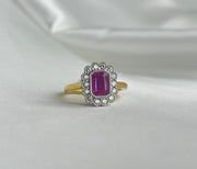 0.80 CT Pink Sapphire and 0.30 CTW Diamond Two Tone Diamond Halo Ring