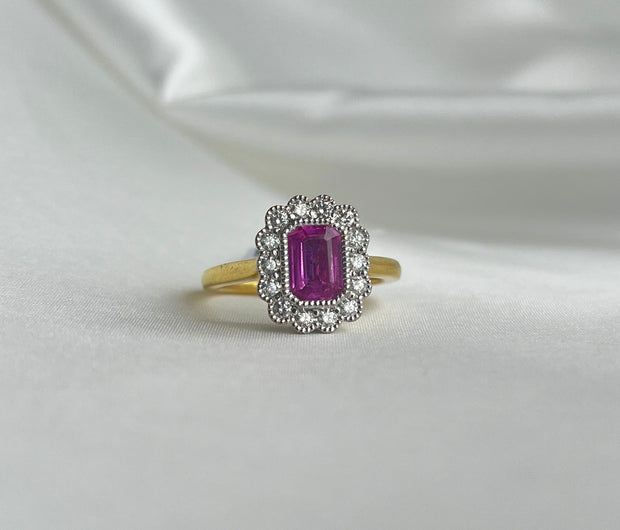 0.80 CT Pink Sapphire and 0.30 CTW Diamond Two Tone Diamond Halo Ring