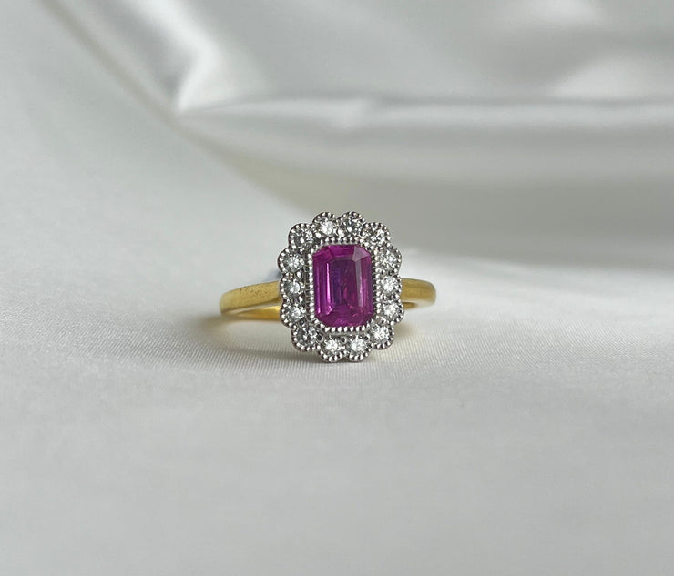 0.80 CT Pink Sapphire and 0.30 CTW Diamond Two Tone Diamond Halo Ring