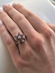 Shown on hand, illustrating the ring’s bold scale and elegant presence.