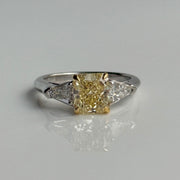 GIA-certified radiant yellow diamond ring in platinum and 18k gold setting