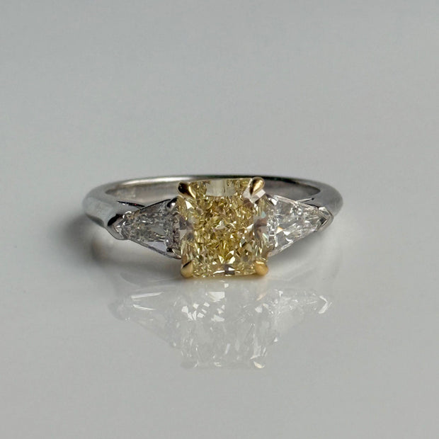 GIA-certified radiant yellow diamond ring in platinum and 18k gold setting