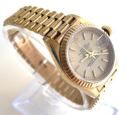 An over the top and side view of th Rolex Presidential Model: 69178.