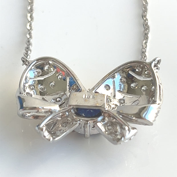 Shown here on the back of the pendant is the 18K hallmark.